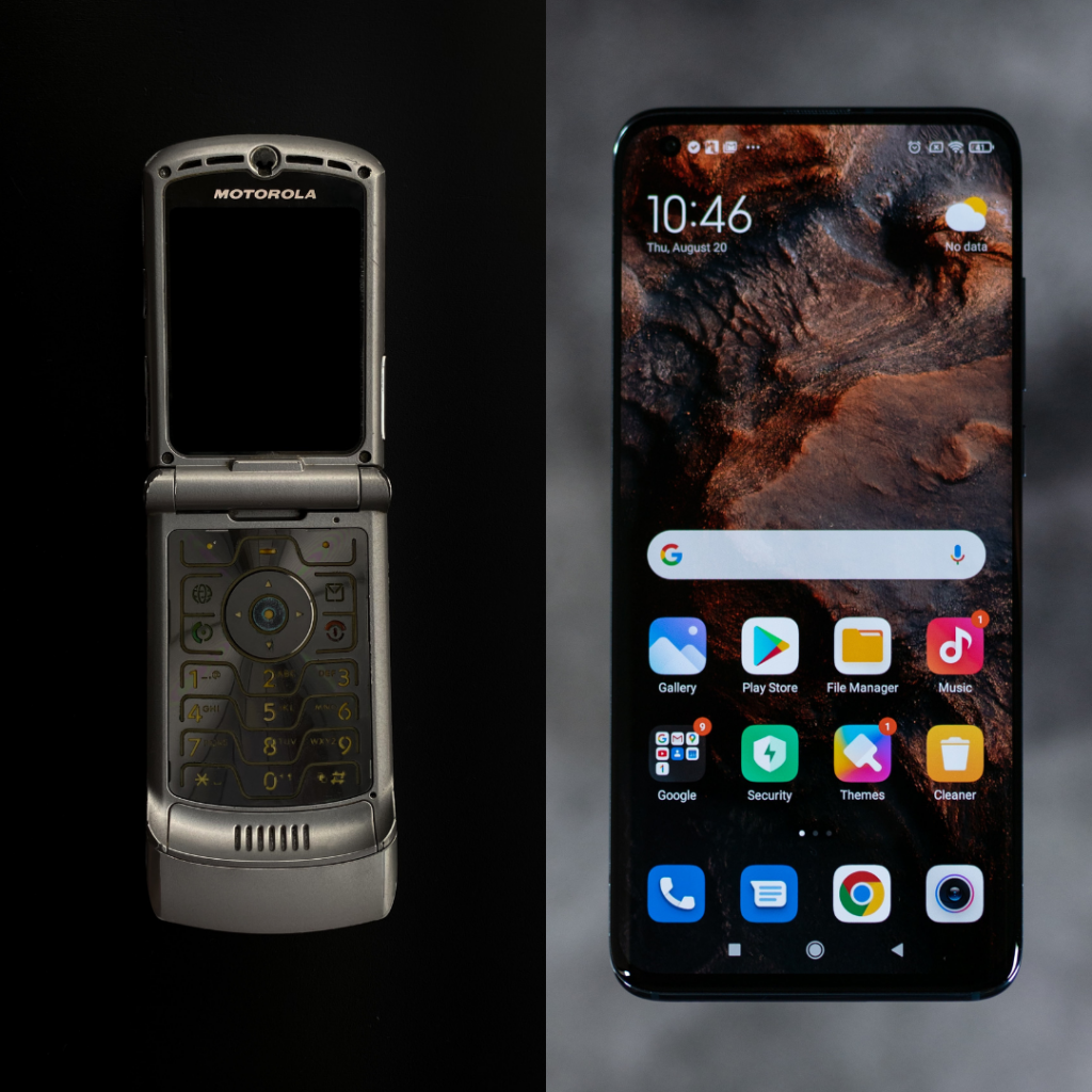 Close up picture of a silver Motorola Flip Phone on the left with a black background, and a black smartphone on the right with a gray background