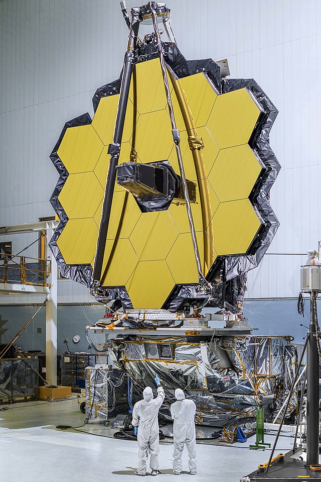 Picture of scientists and engineers working on the James Webb Space Telescope