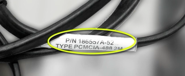 Closeup of an cable sticker part number, circled in yellow