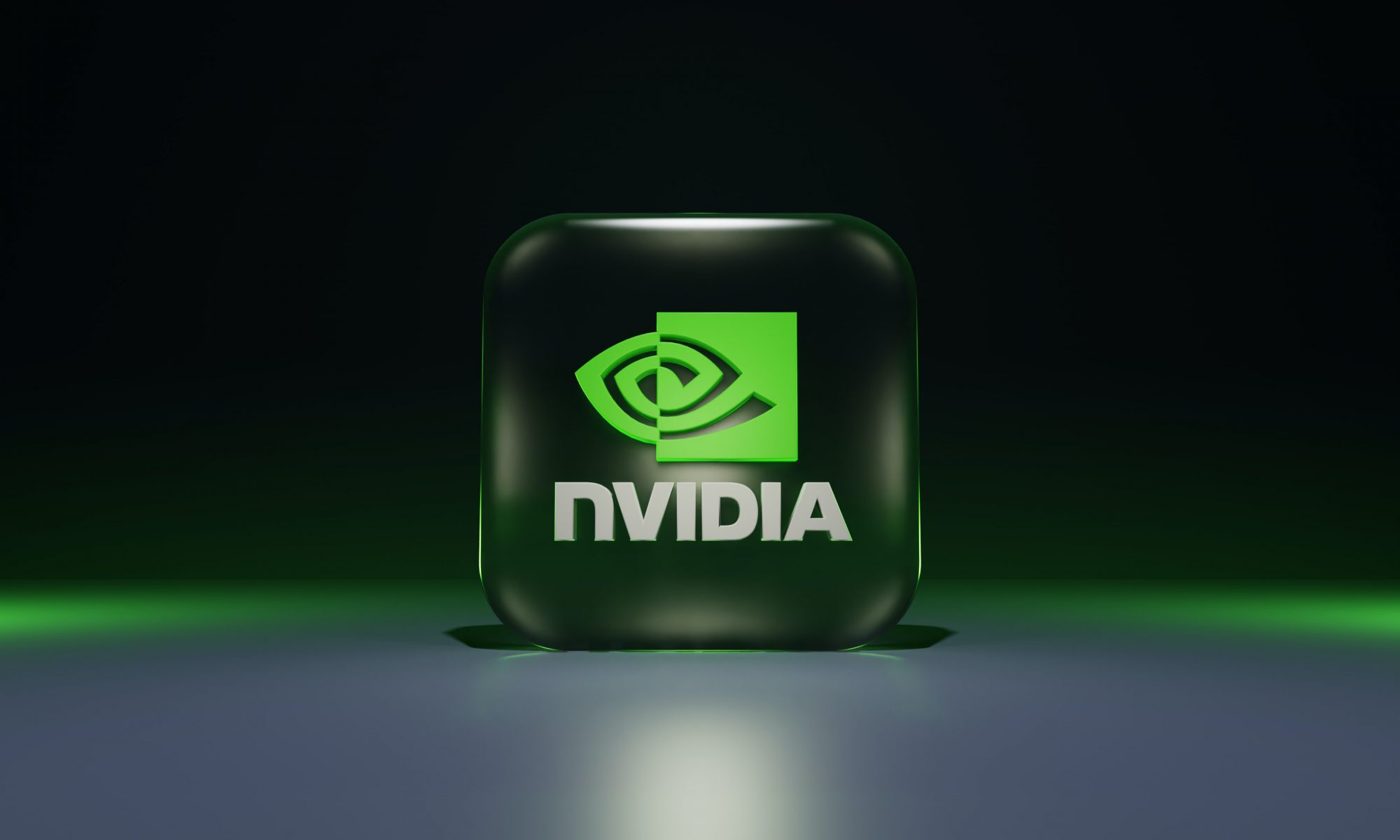 Closeup of green and black NVIDIA logo on a dark background