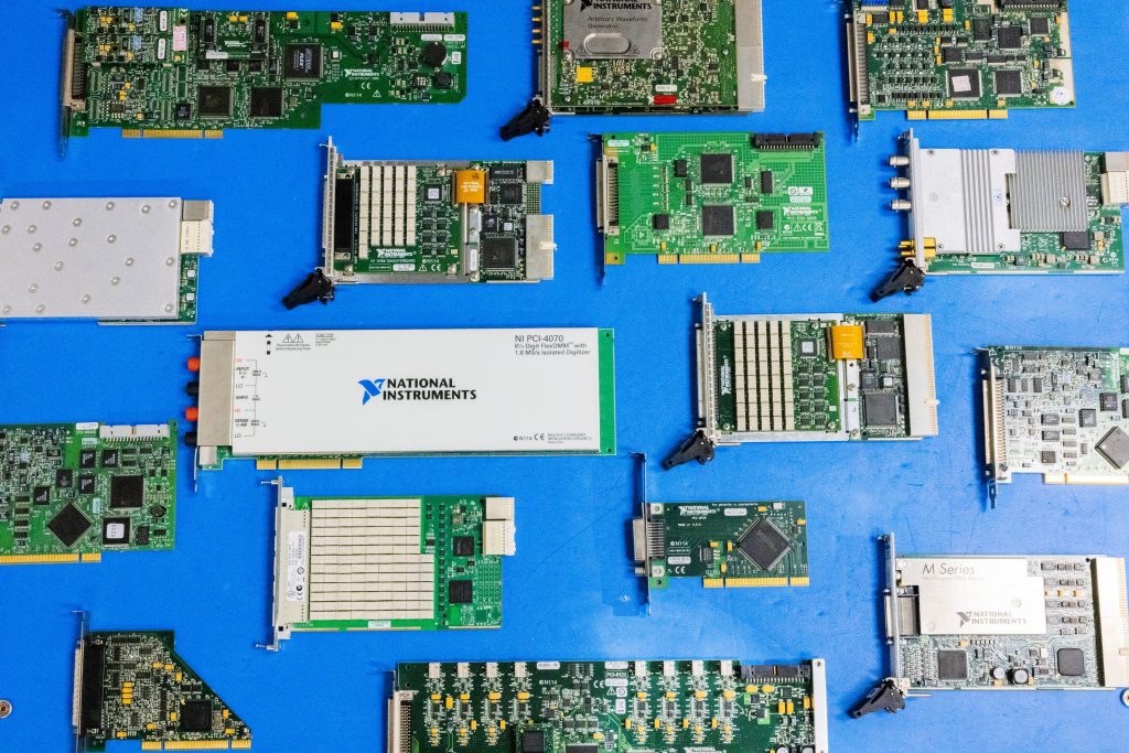Various NI modules on a blue background