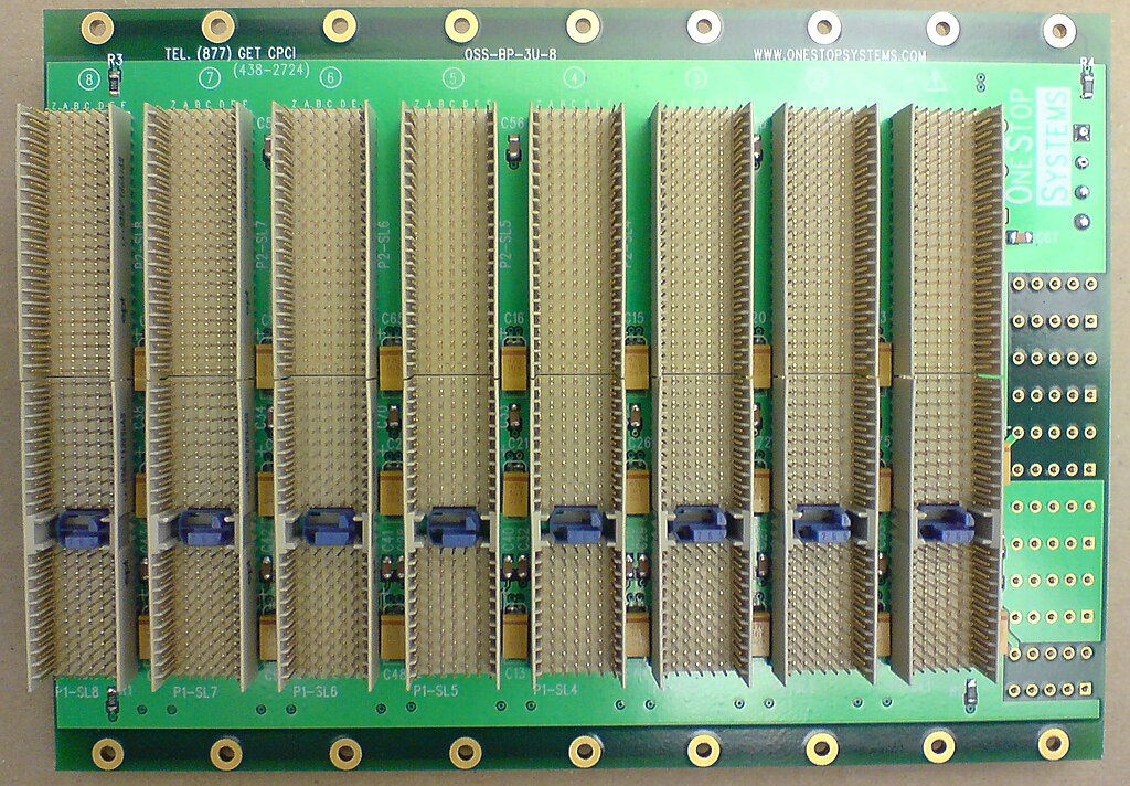 A 3U CompactPCI backplane. The top "J2" connectors are passthrough pins to another connector on the back of the printed circuit board