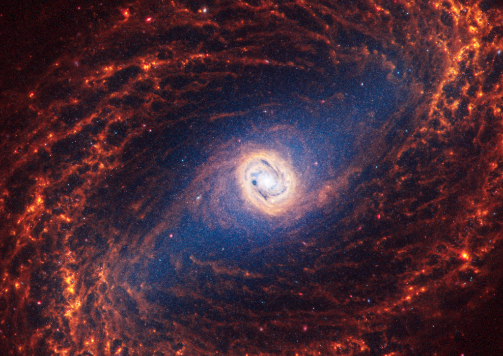 Combined view of Spiral Galaxy 1433 from Webb and Hubble