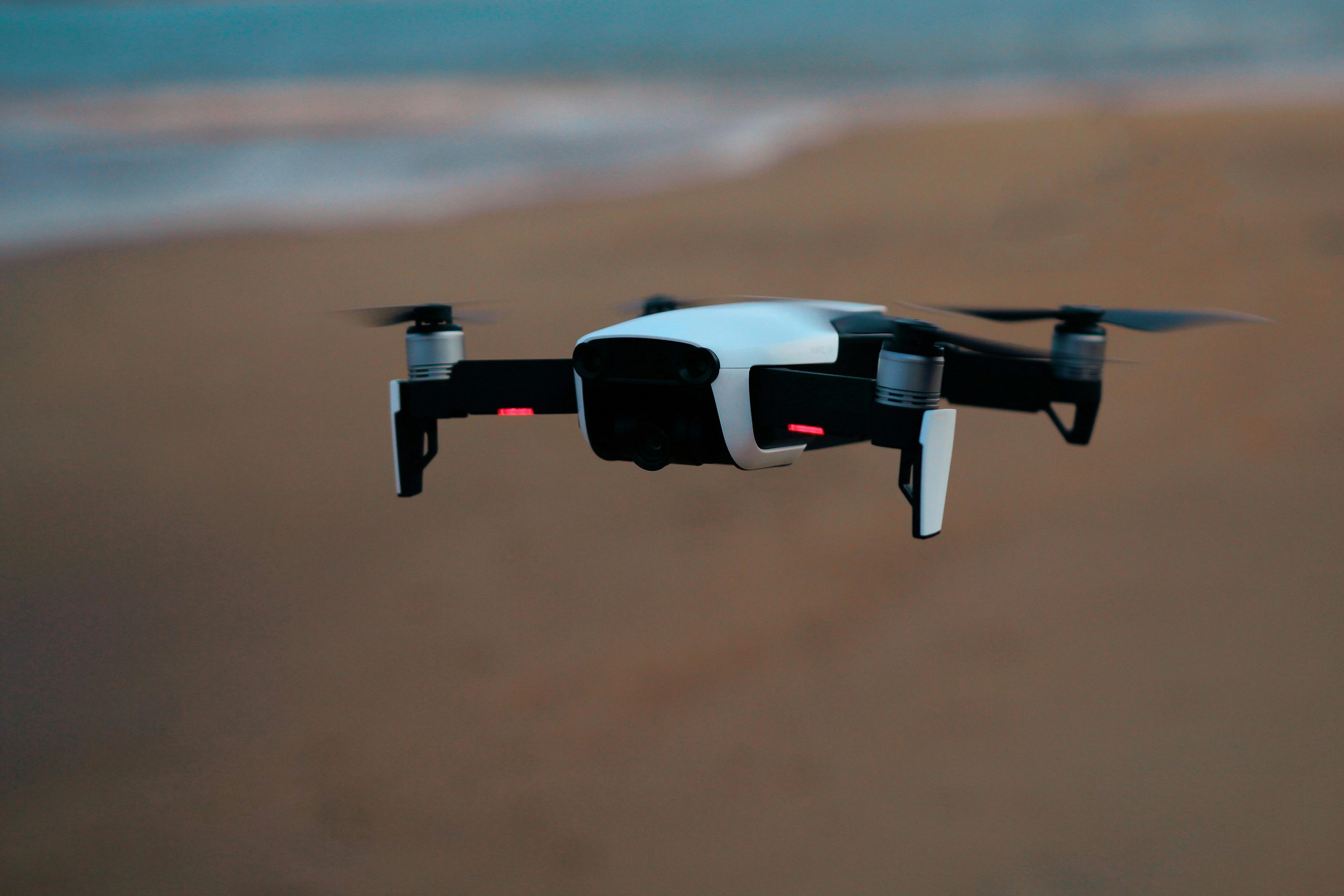 Close-up photography shot of drone flying over land