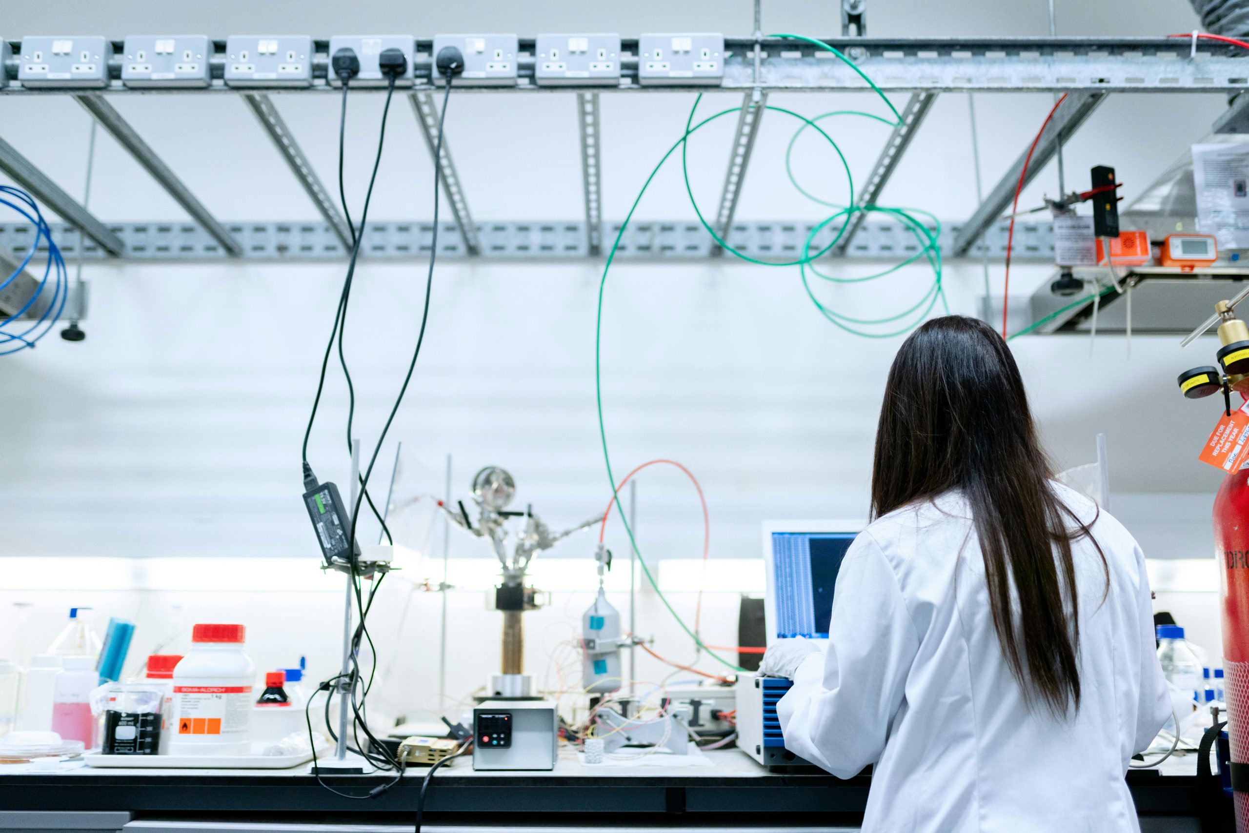 legacy test equipment - woman working in lab