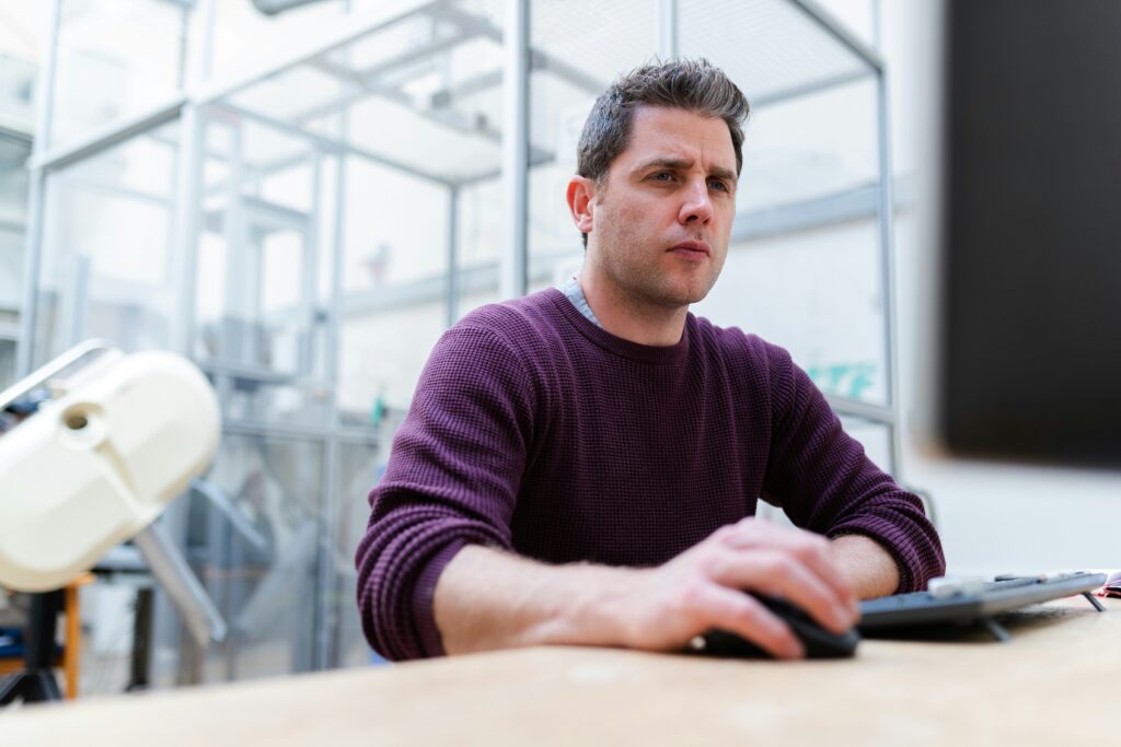 male engineer on computer