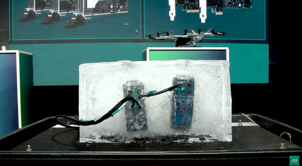 Two NI FieldDAQ modules encased in ice for an on-stage demonstration during NI Connect 2025