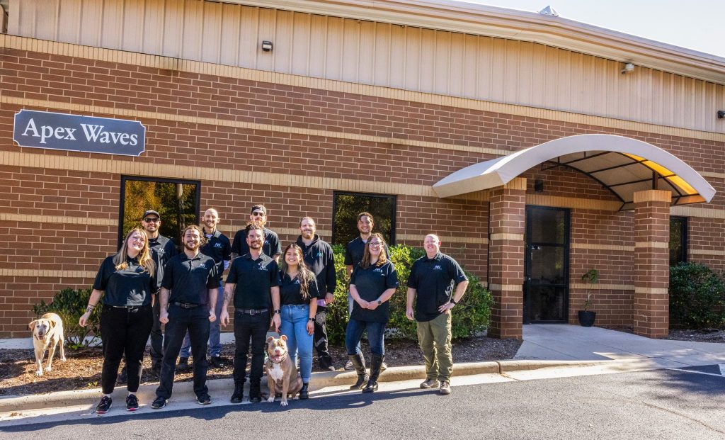 Apex Waves team in front of their new facility