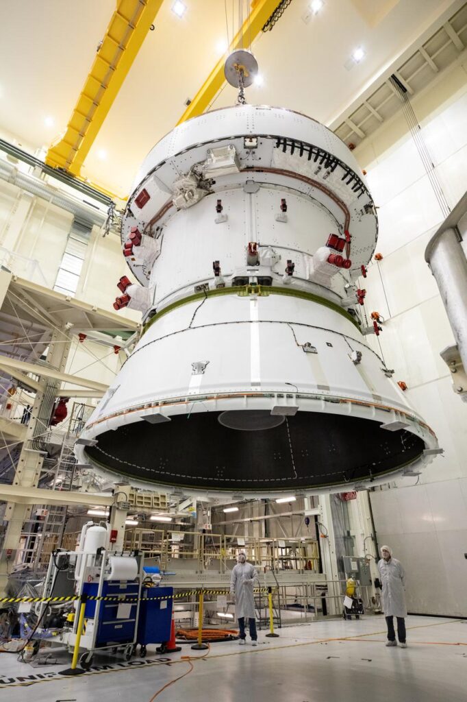 NASA Technicians move the Artemis II Orion Spacecraft out of Production
