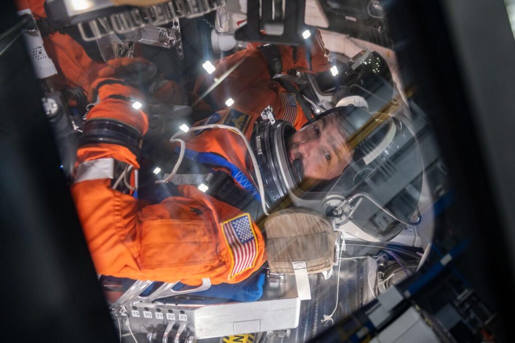 Commander Reid Wiseman tests out the Orion spacecraft